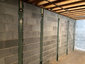 Fortress Straps installed on the basement foundation wall.